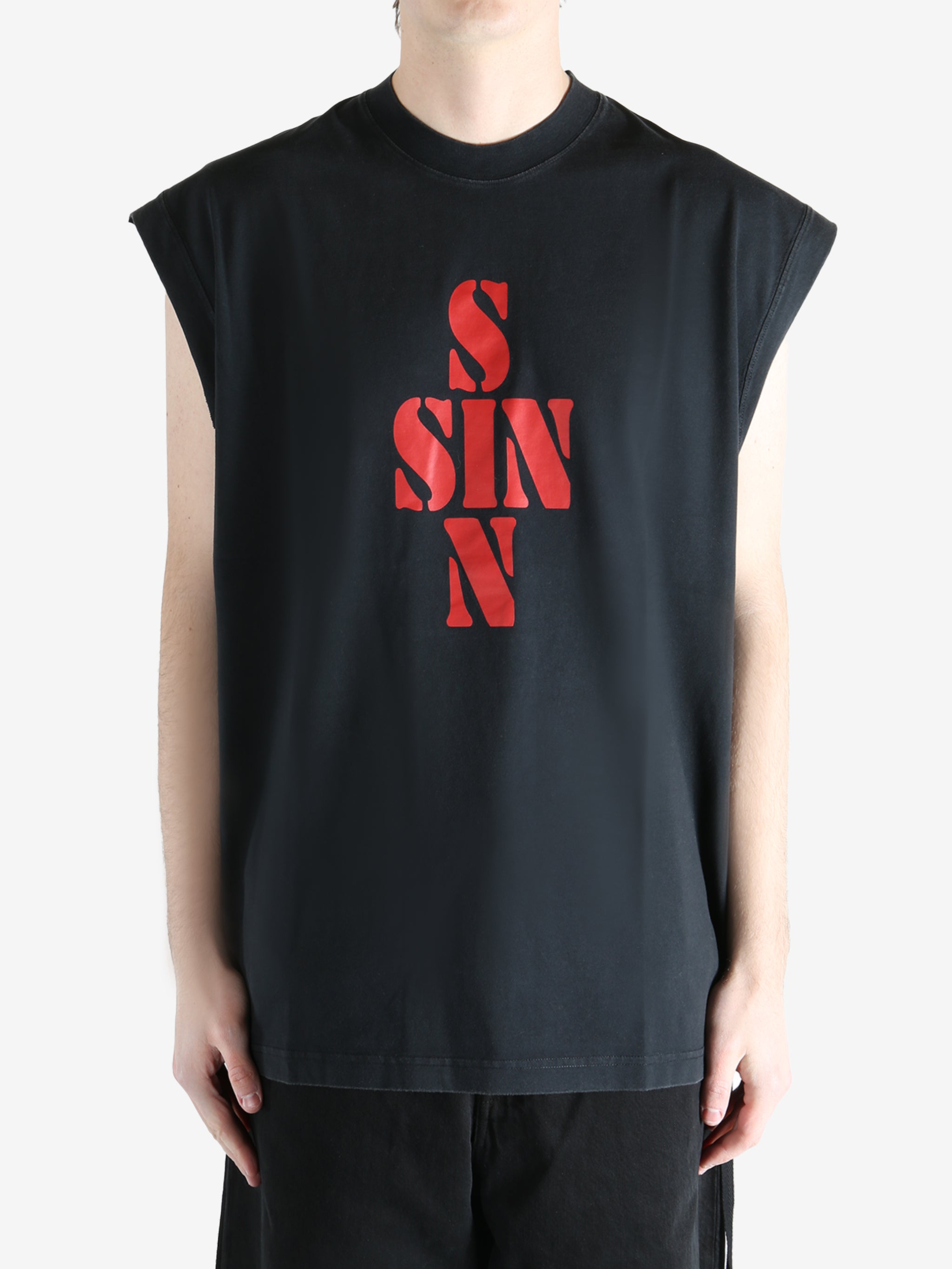 Black T-shirt worn by a person, showing the T-shirt fit