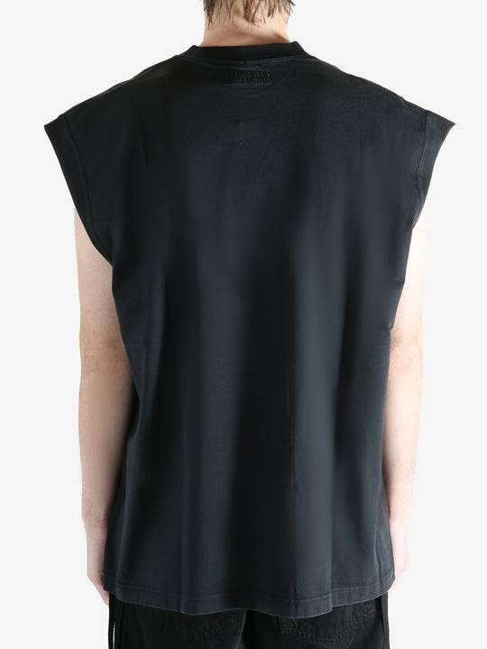 Black T-shirt worn by a person, showing the T-shirt fit