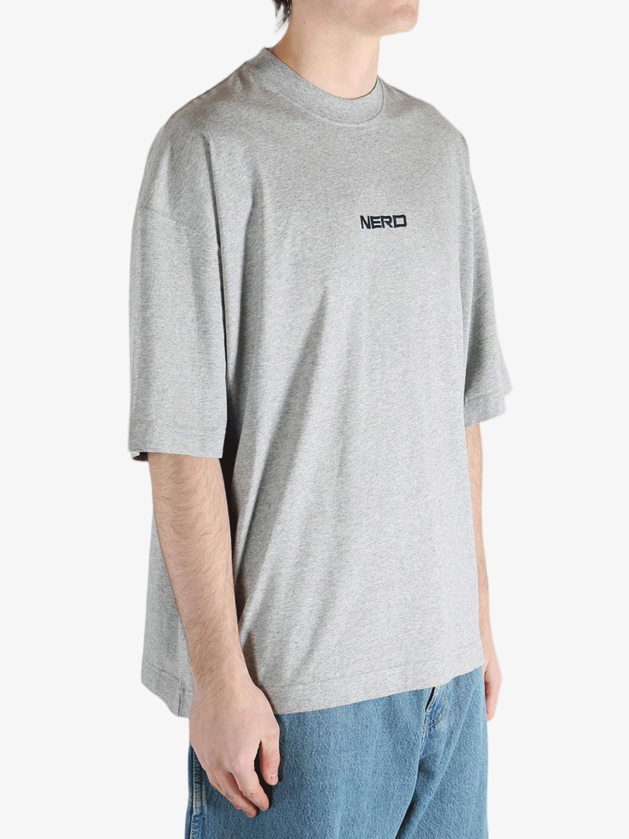 Gray t-shirt worn by a person, showing the shirt's fit