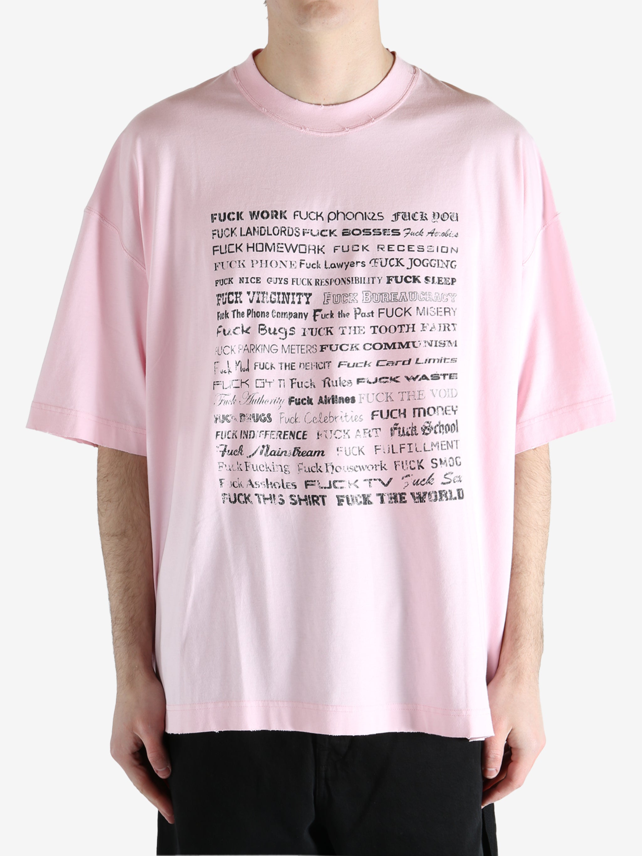 Pink T-shirt worn by a person, showing the T-shirt fit