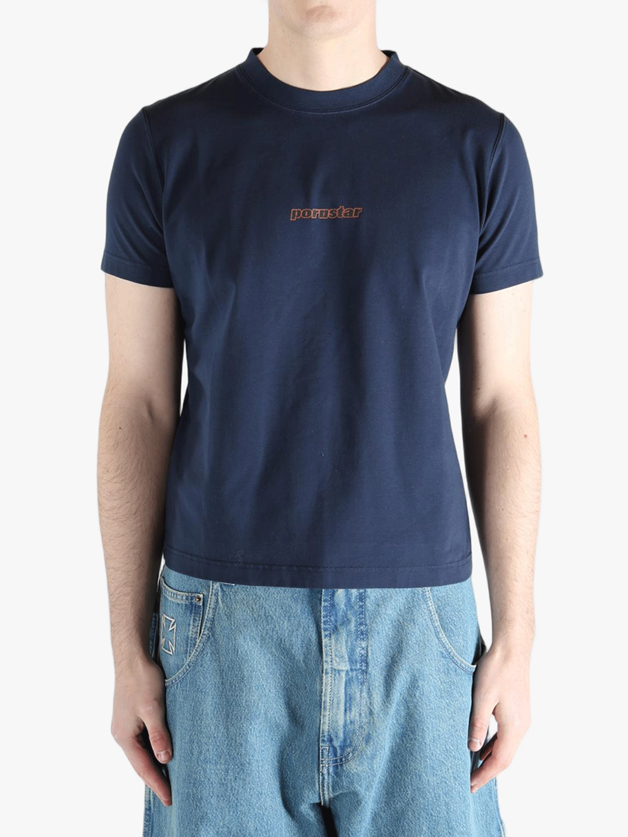 Navy t-shirt worn by a person, showing the shirt's fit