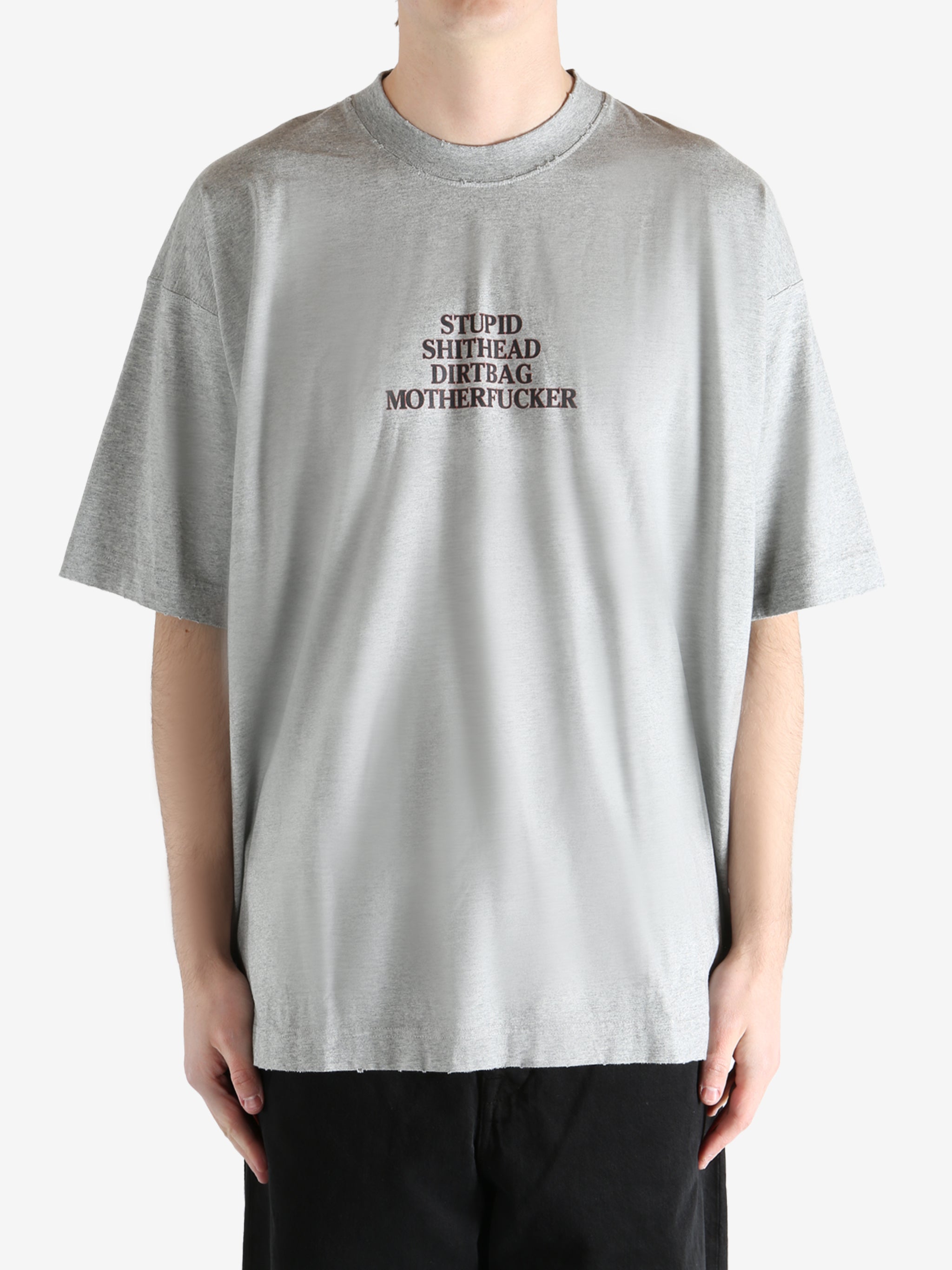 GREY MELANGE T-shirt worn by a person, showing the T-shirt fit