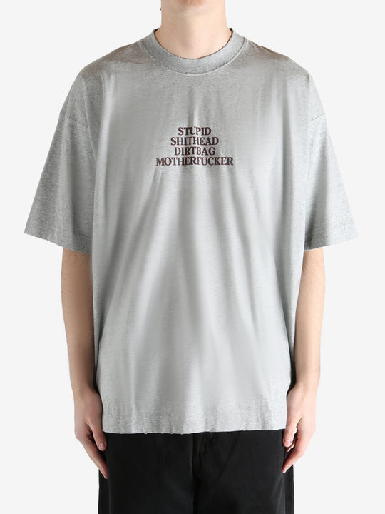 GREY MELANGE T-shirt worn by a person, showing the T-shirt fit