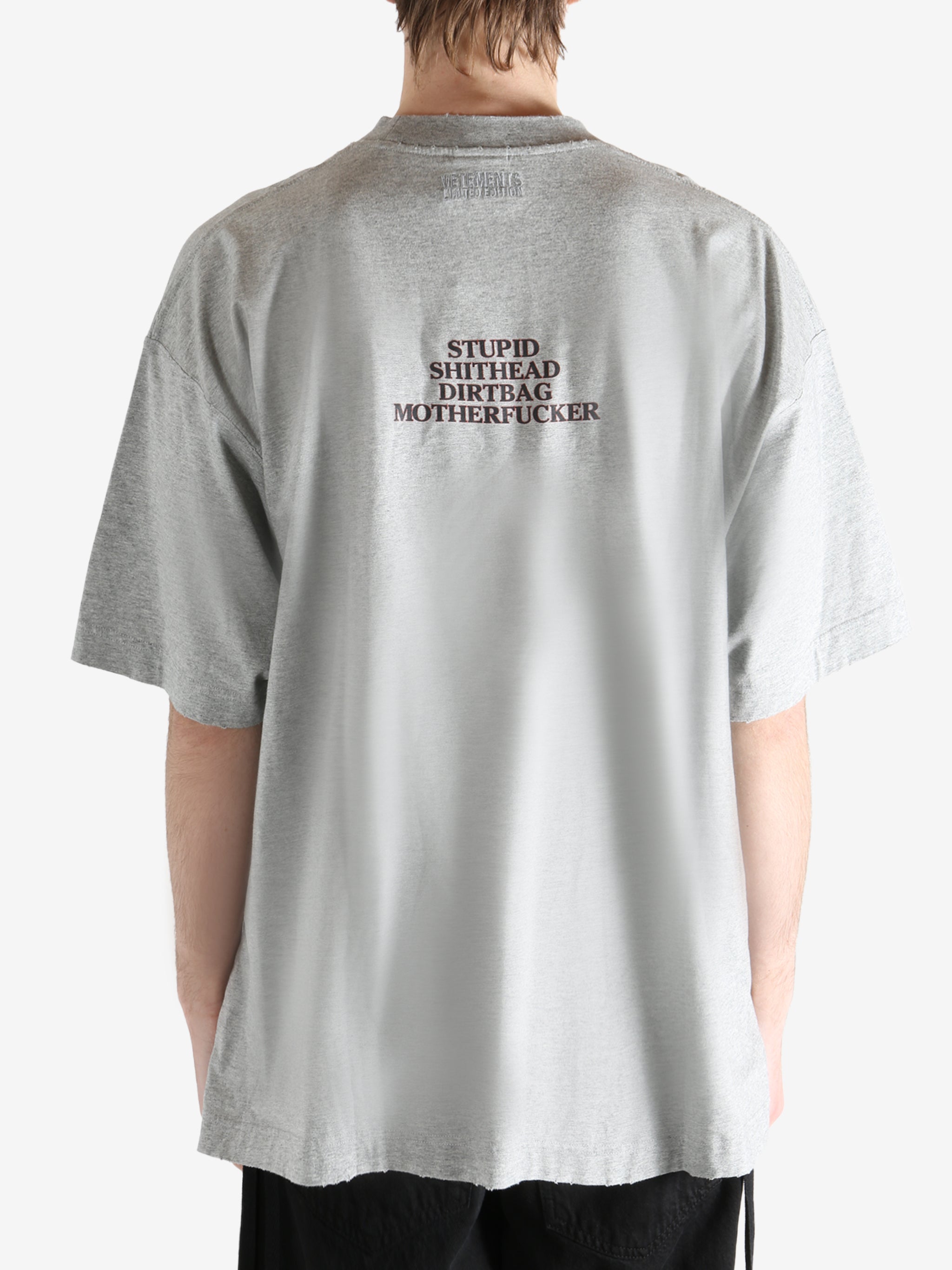 GREY MELANGE T-shirt worn by a person, showing the T-shirt fit