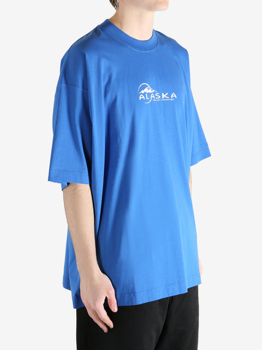 Blue T-shirt worn by a person, showing the T-shirt fit