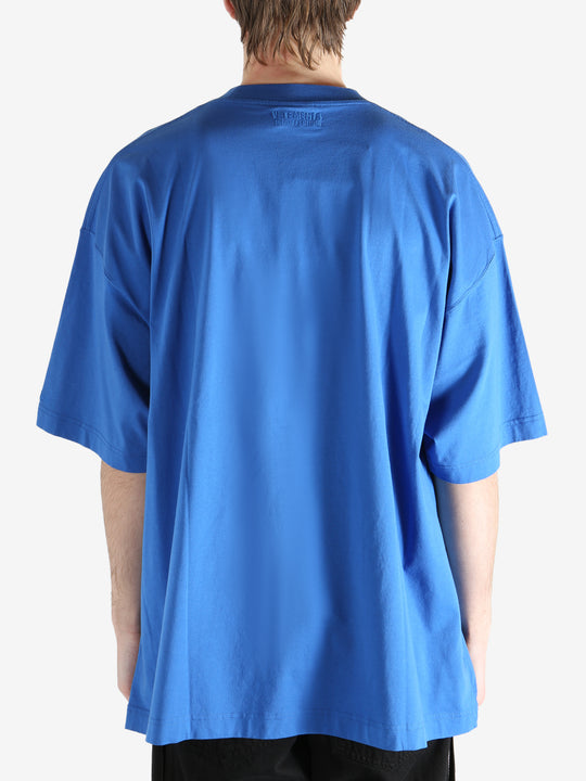 Blue T-shirt worn by a person, showing the T-shirt fit