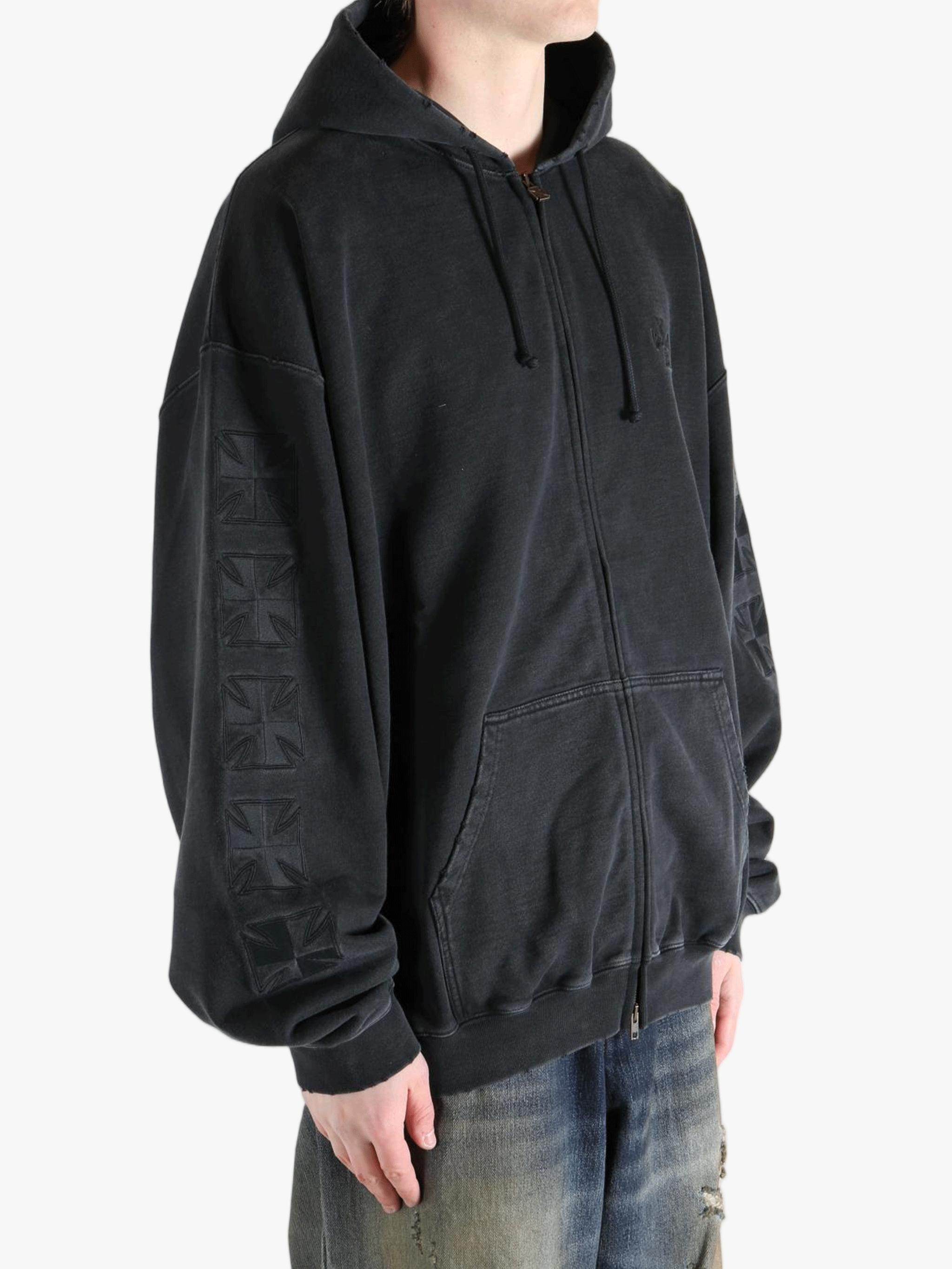 Black hoodie worn by a person, showing the hoodie fit