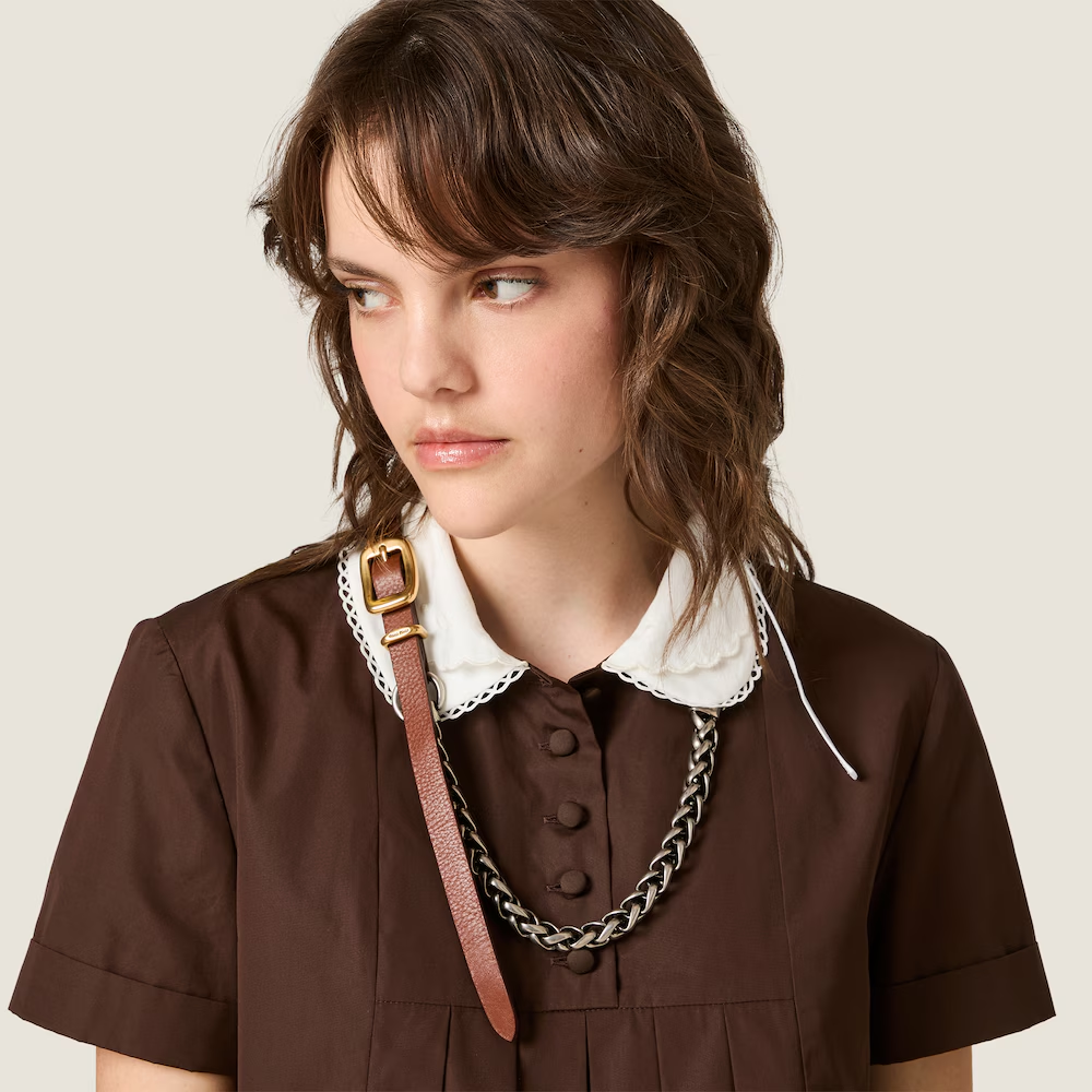 Brown dress worn by a person, showing the dress fit