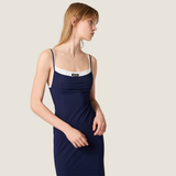 Navy dress worn by a person, showing the dress fit
