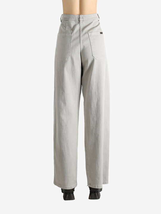 Grey pants worn by a person, showing the pants' fit