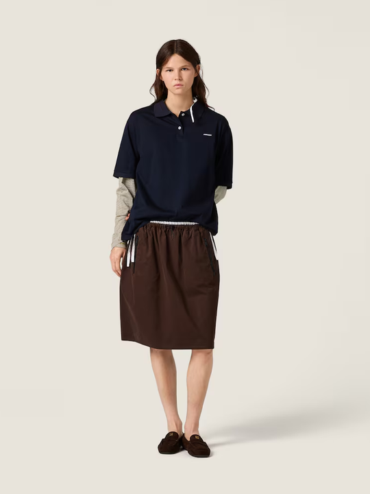 Navy shirt, full body view
