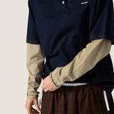 Navy shirt worn by a person, showing the shirt fit