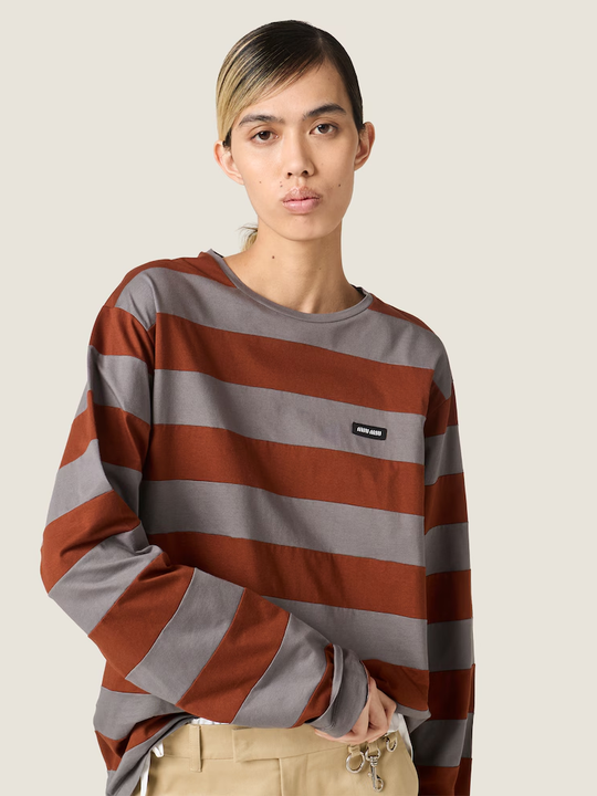 Grey t-shirt worn by a person, showing the t-shirt fit