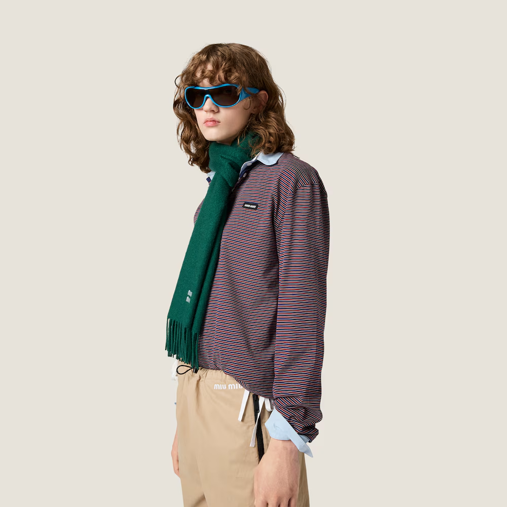 Navy top worn by a person, showing the top fit