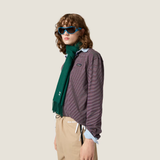 Navy top worn by a person, showing the top fit