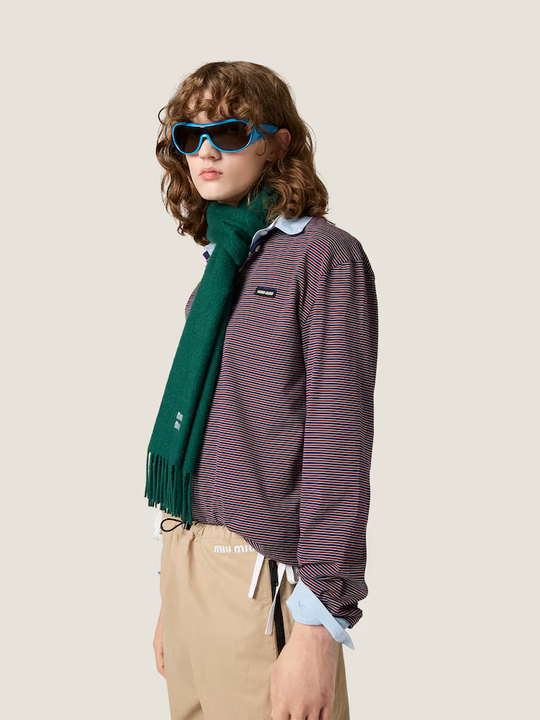 Navy top worn by a person, showing the top fit