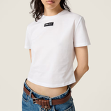 White shirt worn by a person, showing the shirt fit