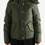 Green jackets worn by a person, showing the jackets fit