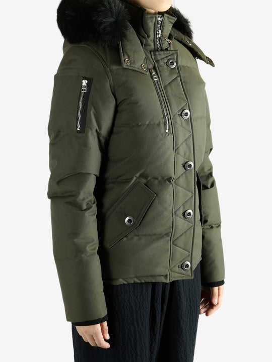 Green jackets worn by a person, showing the jackets fit