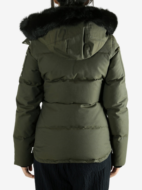 Green jackets worn by a person, showing the jackets fit