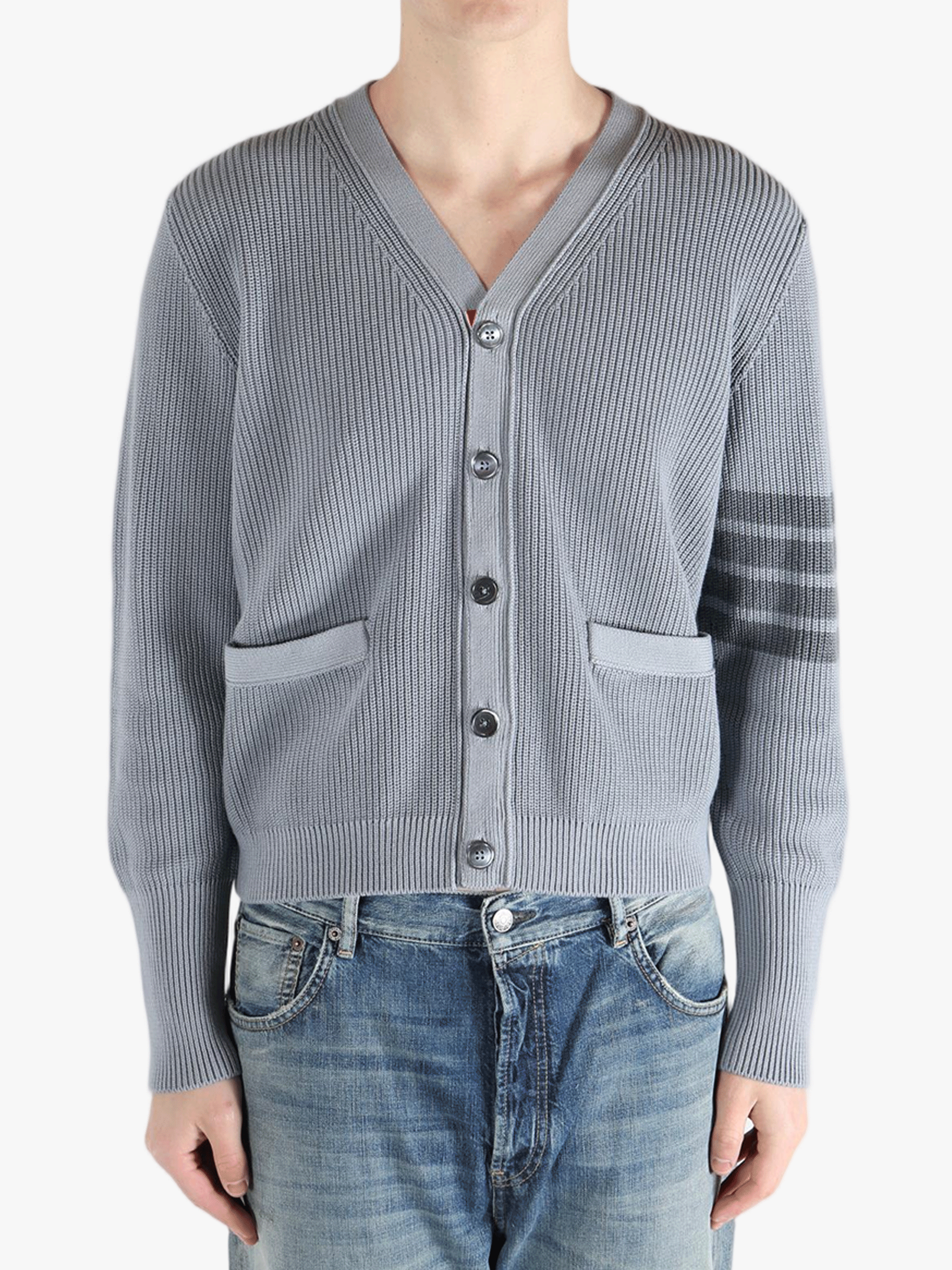 Grey cardigan worn by a person, showing the cardigan fit