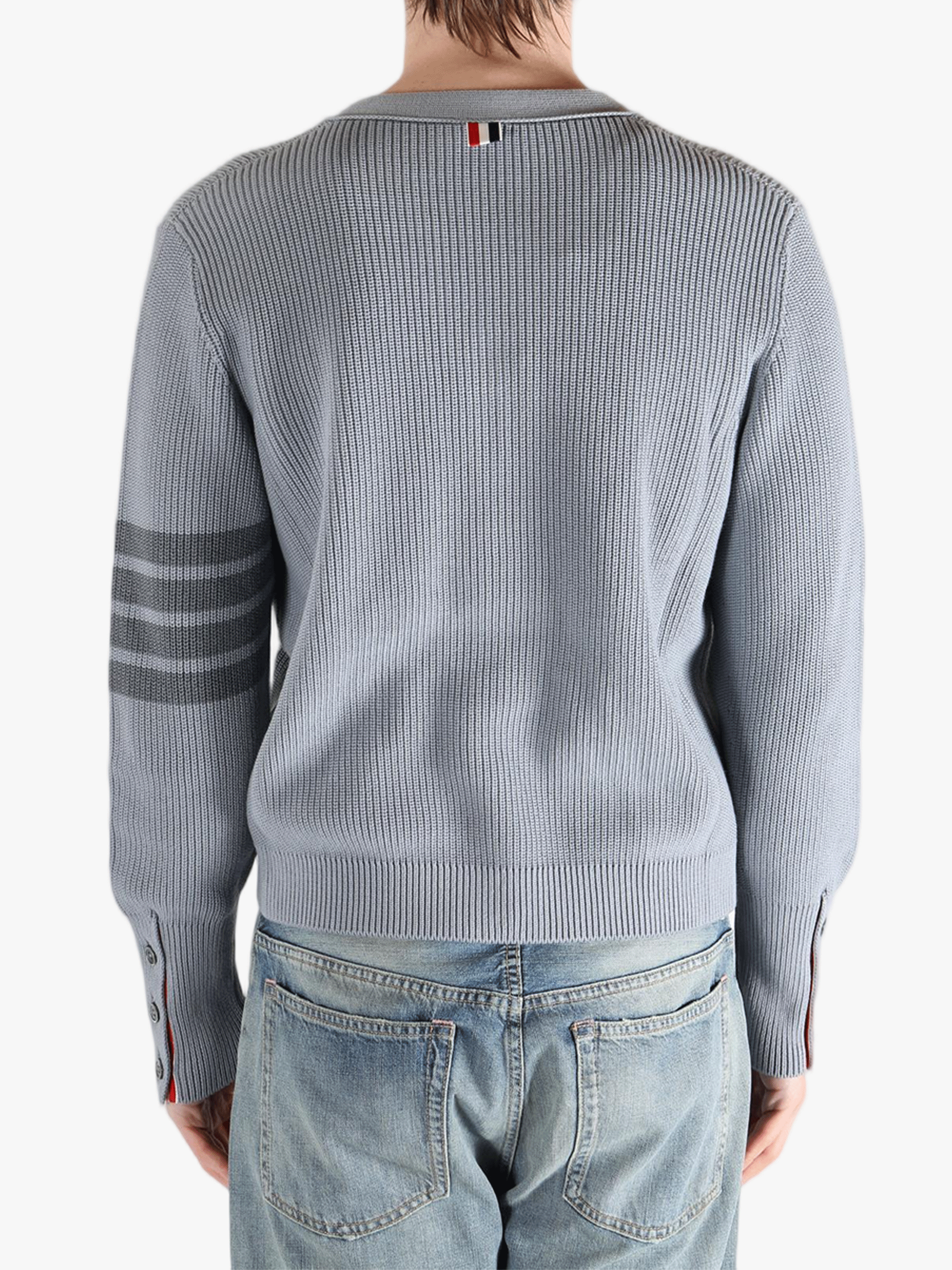 Grey cardigan worn by a person, showing the cardigan fit