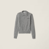 Grey knitwear, front view