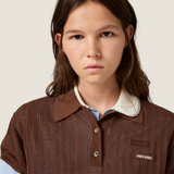 Brown shirt worn by a person, showing the shirt fit