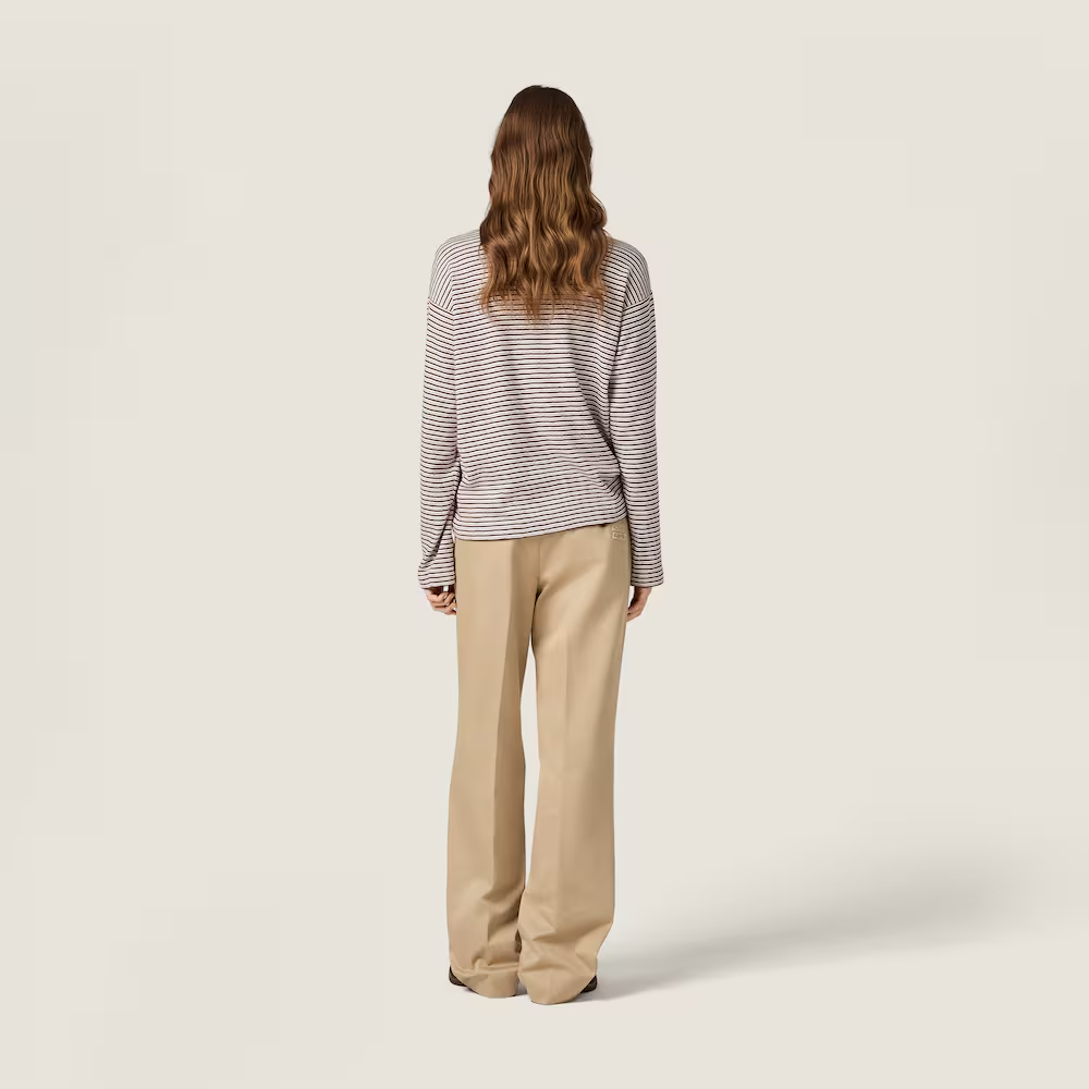Brown knitwear, full body view