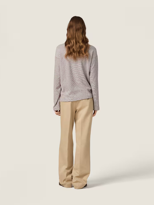 Brown knitwear, full body view