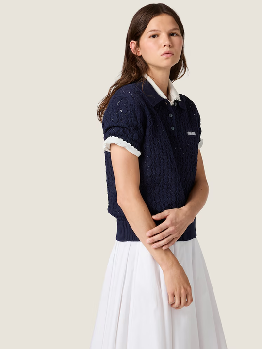 Navy shirt worn by a person, showing the shirt fit