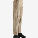 Brown pants worn by a person, showing the pants fit