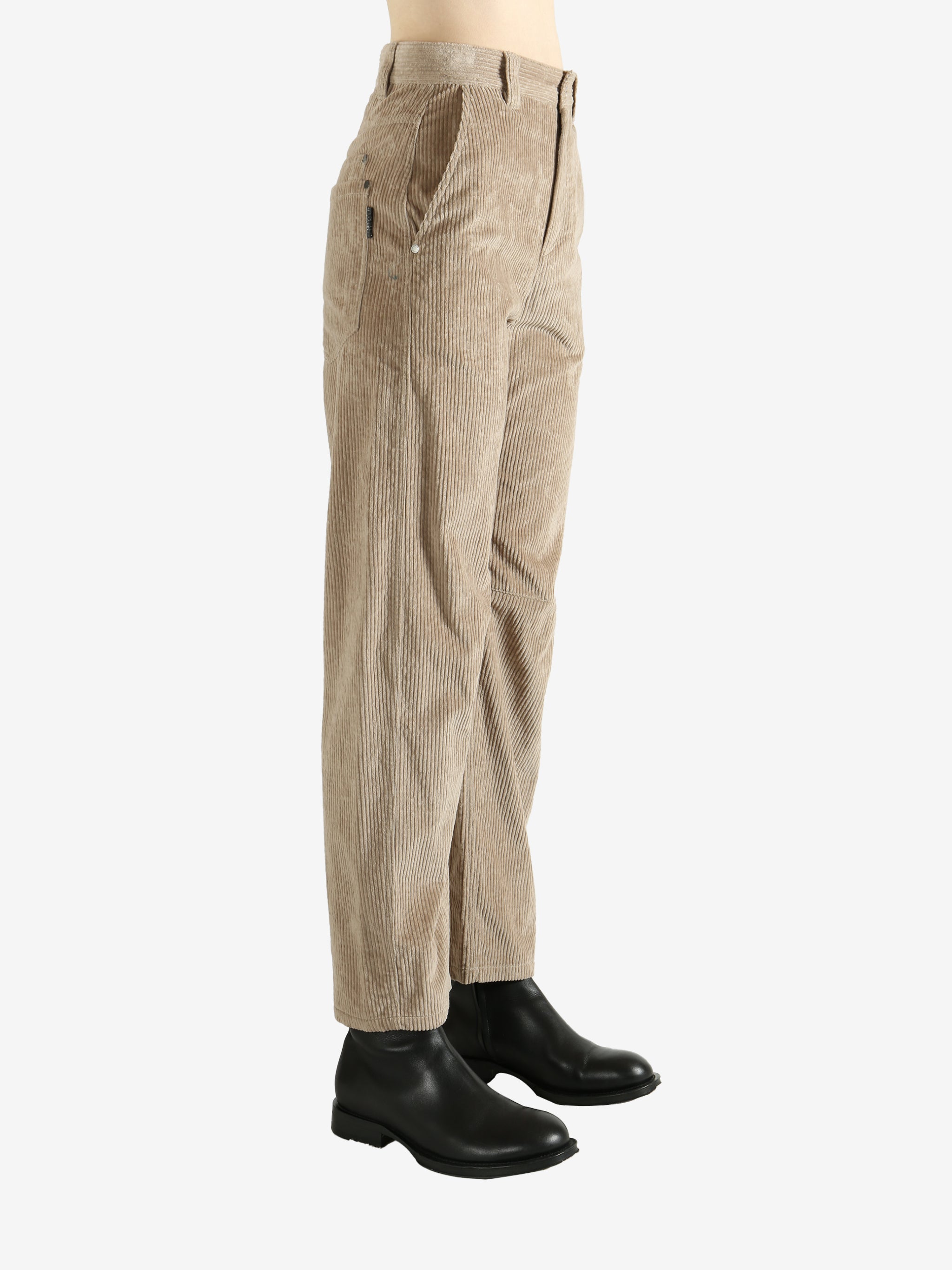 Brown pants worn by a person, showing the pants fit