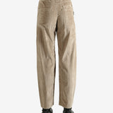 Brown pants worn by a person, showing the pants fit