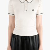 White t-shirt worn by a person, showing the t-shirt fit
