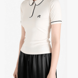 White t-shirt worn by a person, showing the t-shirt fit