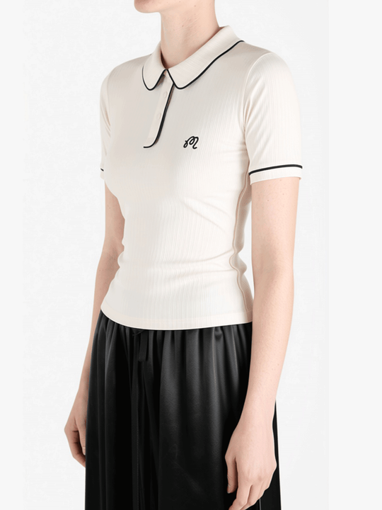 White t-shirt worn by a person, showing the t-shirt fit