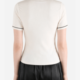 White t-shirt worn by a person, showing the t-shirt fit