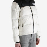 White jacket worn by a person, showing the jacket fit