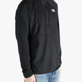 Black jacket worn by a person, showing the jacket fit