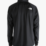 Black jacket worn by a person, showing the jacket fit