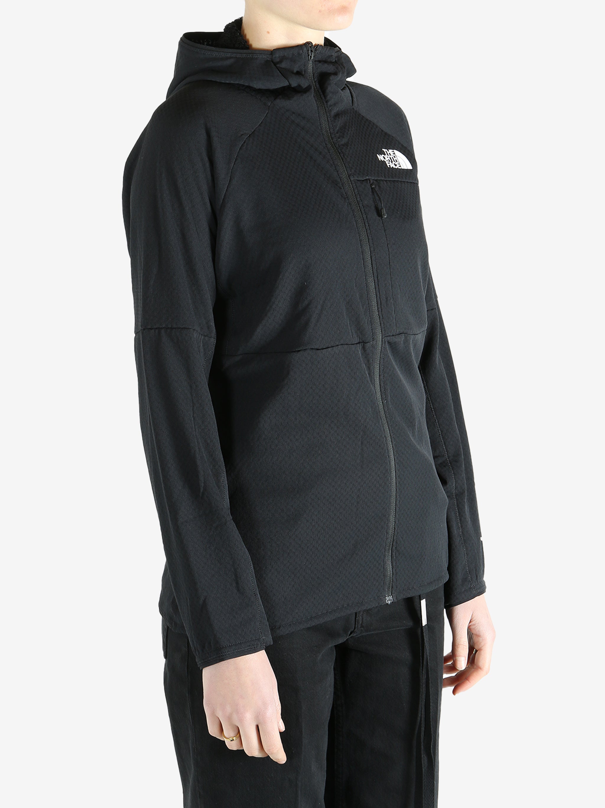 Black hoodies worn by a person, showing the hoodies fit