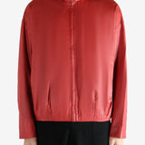 Red jacket worn by a person, showing the jacket's fit