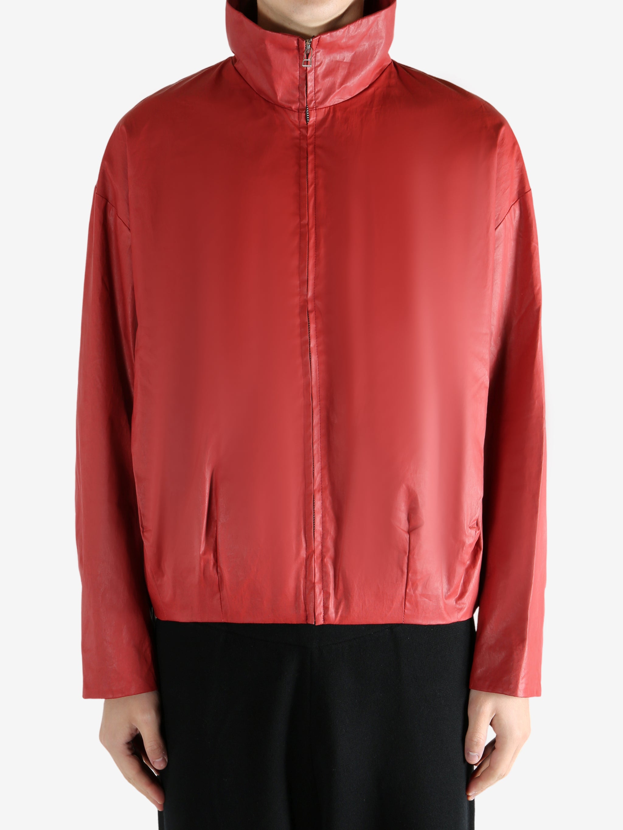 Red jacket worn by a person, showing the jacket's fit