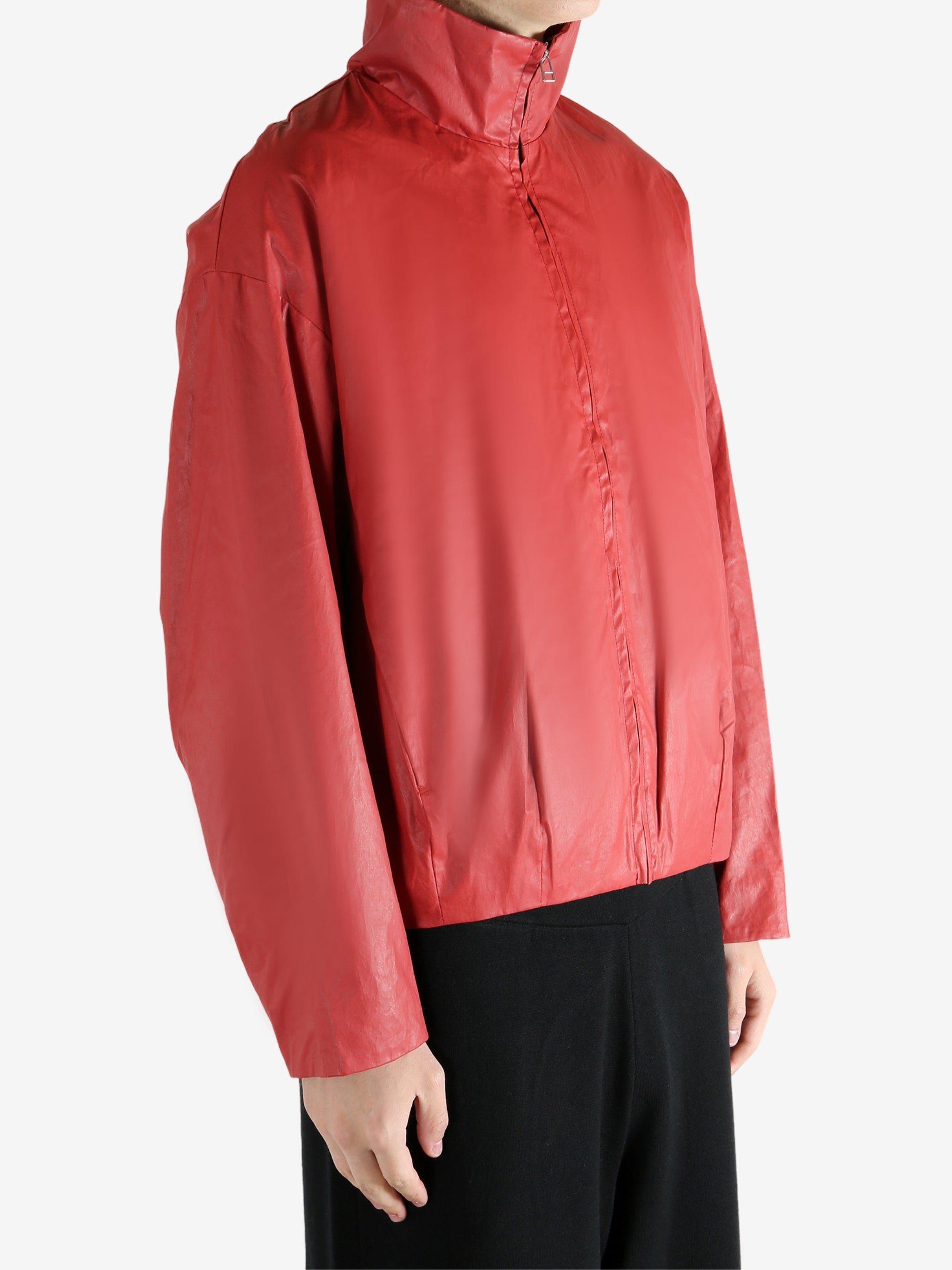 Red jacket worn by a person, showing the jacket's fit