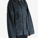 Blue jacket worn by a person, showing the jacket fit