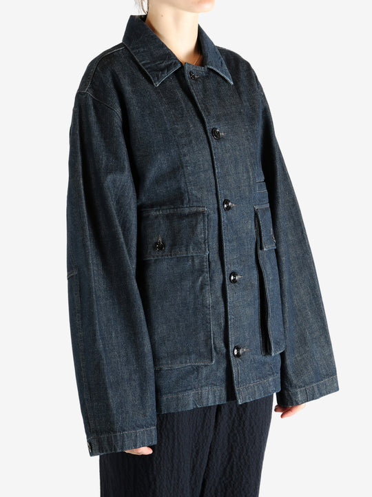 Blue jacket worn by a person, showing the jacket fit