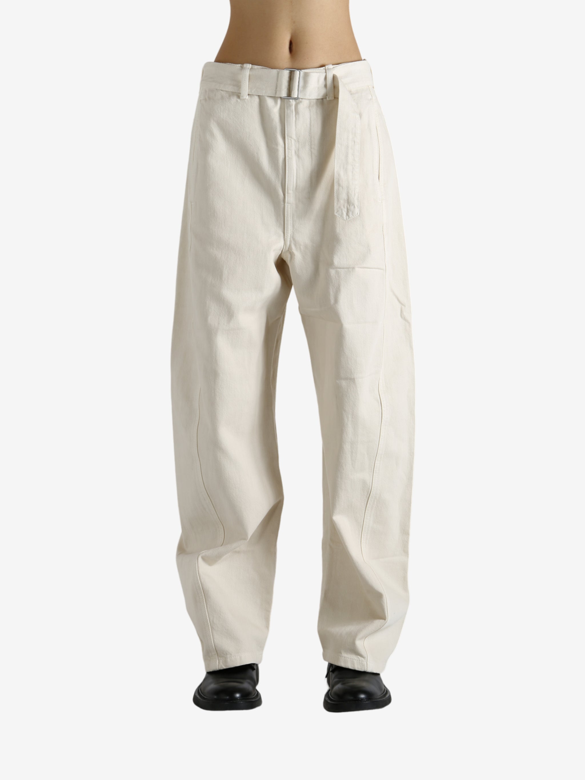 Tan pants worn by a person, showing the pants fit
