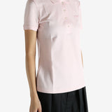 Pink shirt worn by a person, showing the shirt's fit