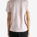 Pink shirt worn by a person, showing the shirt's fit